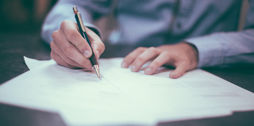 Man with pen and paper